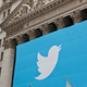 A Twitter poster covers the front of the New York Stock Exchange in 2013.